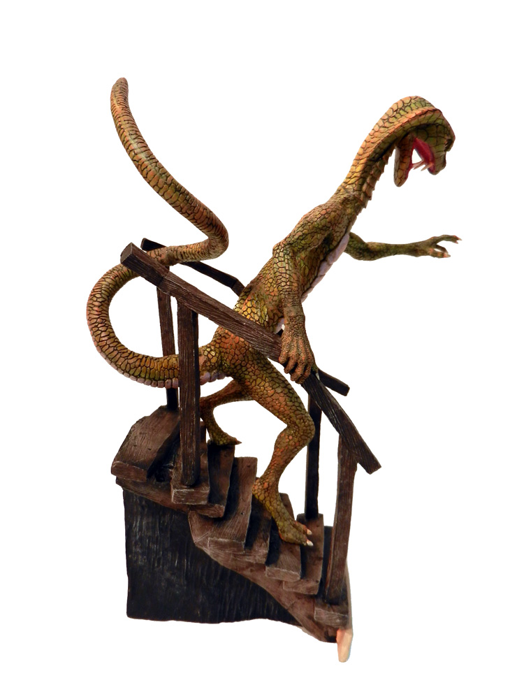 snake man figurine